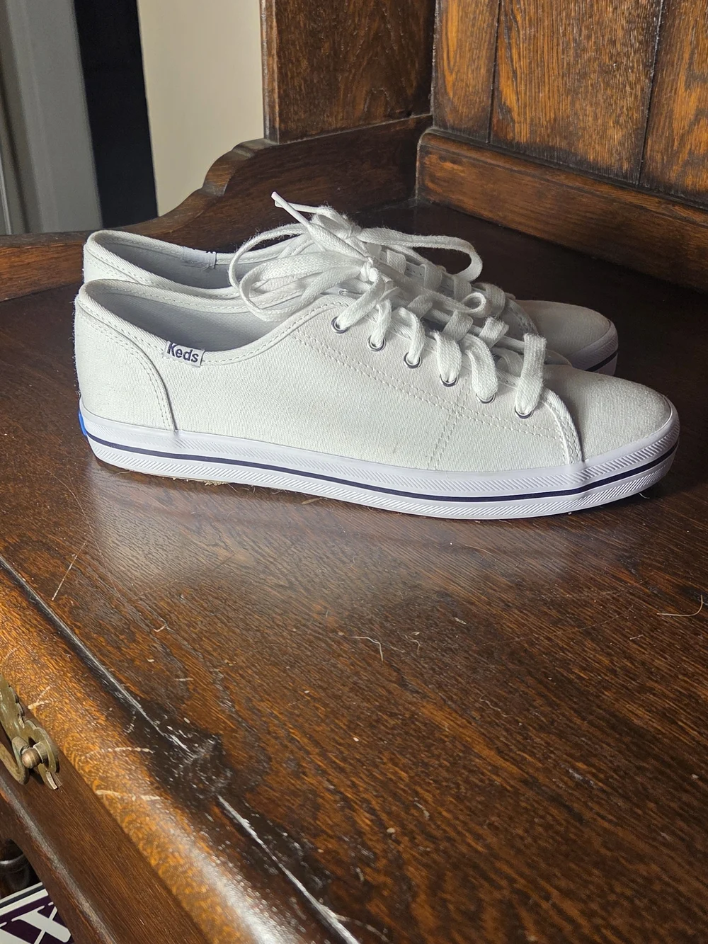 Keds Women's White Kickstart Canvas Low-Top Sneakers with Subtle Blue Trim.